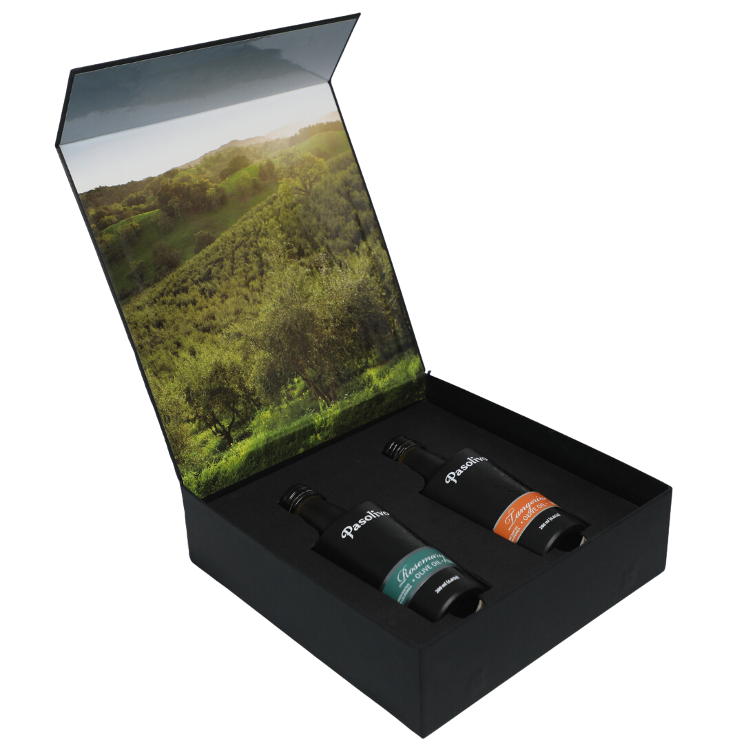 Premium Pasolivo products packaged in beautiful black box with green olive orchard imagery.